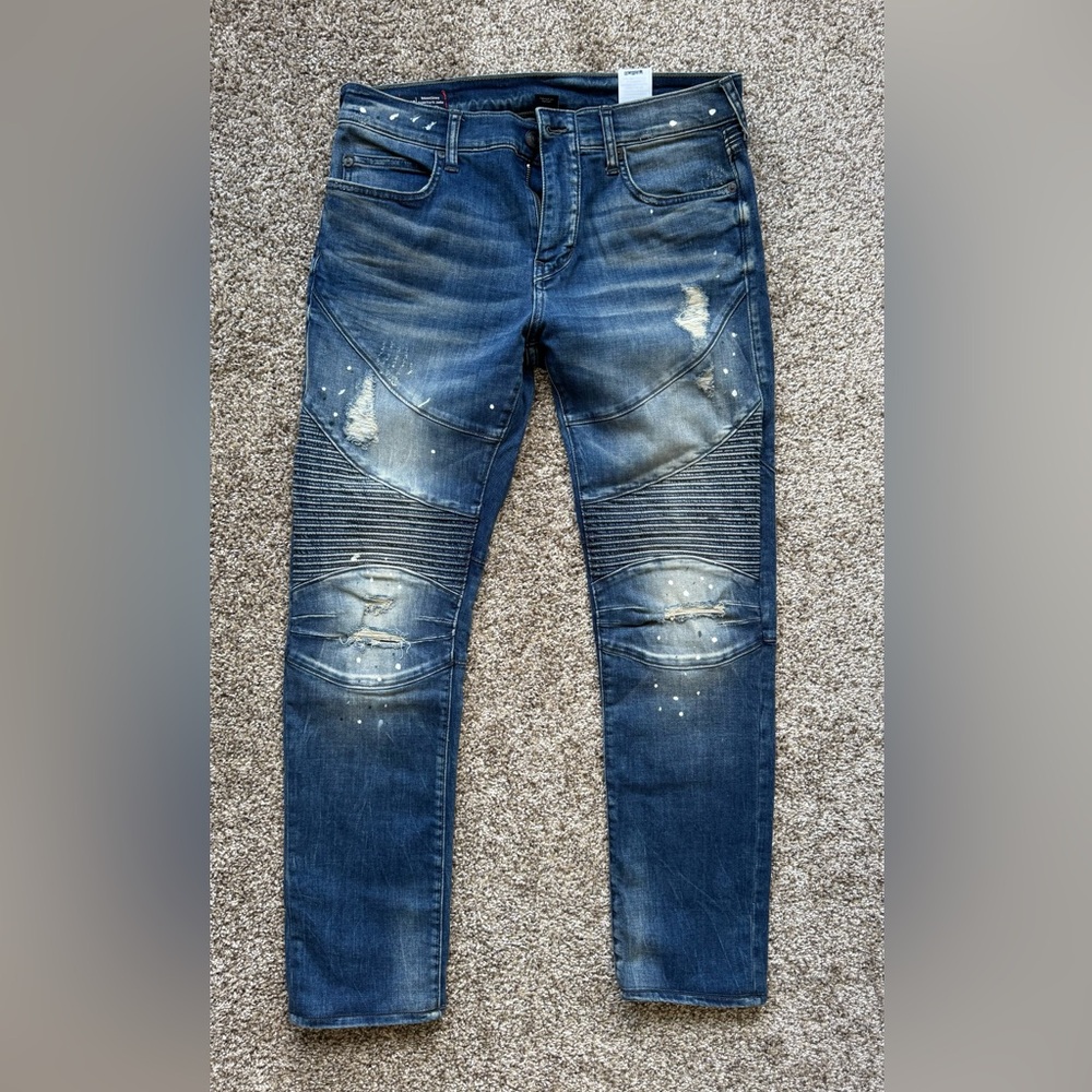 True Religion Distressed Blue Biker Jeans with Paint Splatter
